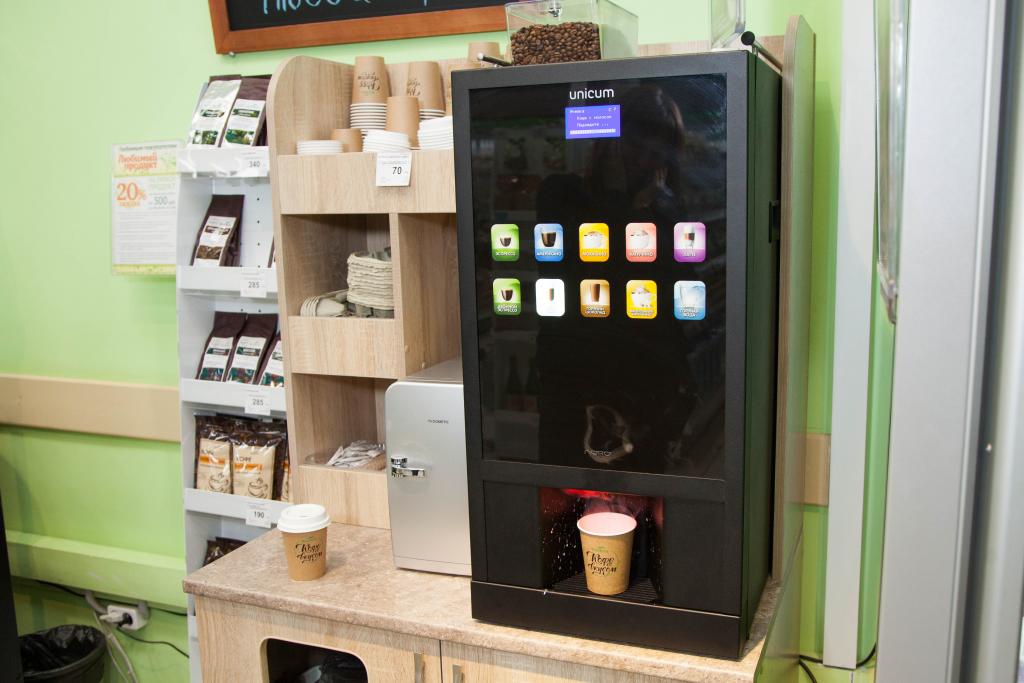 Купить кофе аппарат самообслуживания для бизнеса. Вендинговый аппарат Уникум. Unicum вендинг. Unicum кофейный автомат. Вендинговый аппарат кофе самообслуживания.
