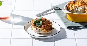 Улитки из лаваша с сыром и ветчиной