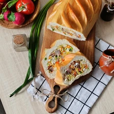 Батон, фаршированный сельдью, морковью, яйцом и зеленью