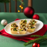 Тарталетки с баклажанами и соусом песто