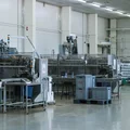 На производстве установлено 12 импортных фасовочных станков. Чтобы обеспечить безопасность продукта, на всех станках установлены просеивающие решётки и система металлоуловителей