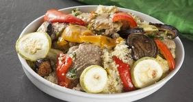 Цесарка с кускусом и овощами